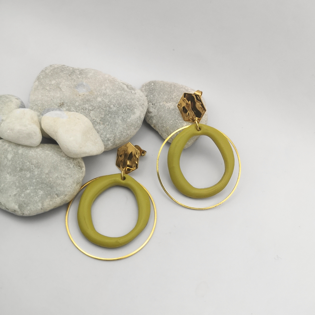 Green hoop earrings with gold accents