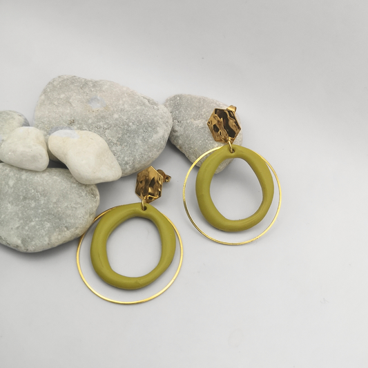 Green hoop earrings with gold accents