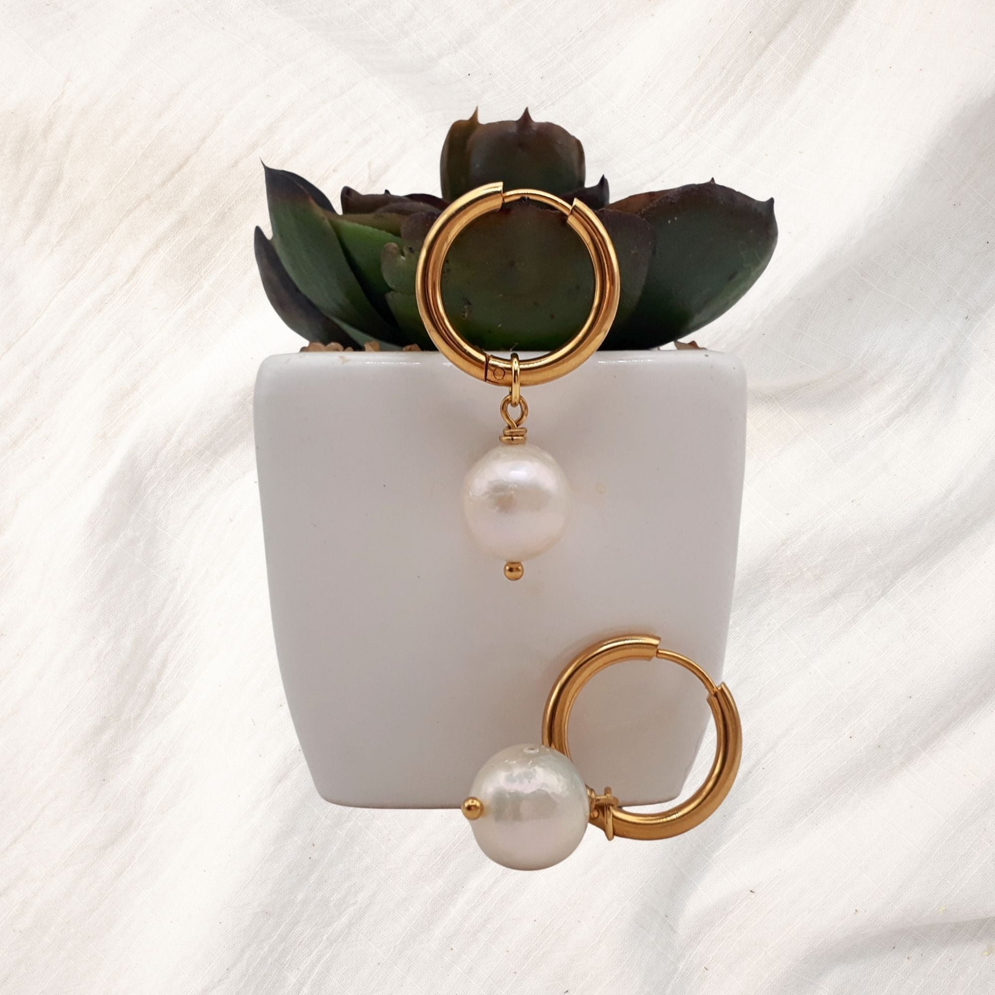 Elegant freshwater pearl earrings with modern designs, ideal for everyday wear.”