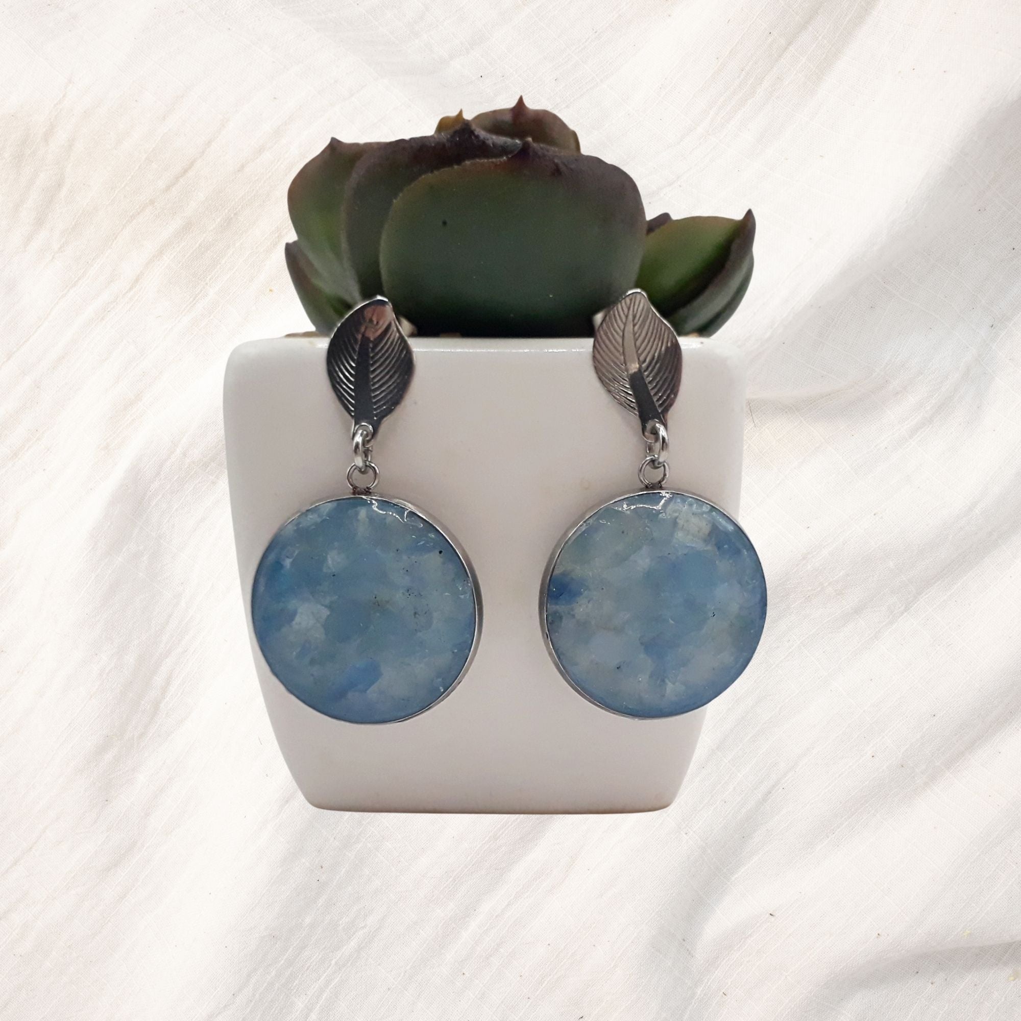 Crushed gemstone earring collection with colorful designs, artisan-crafted for modern elegance.