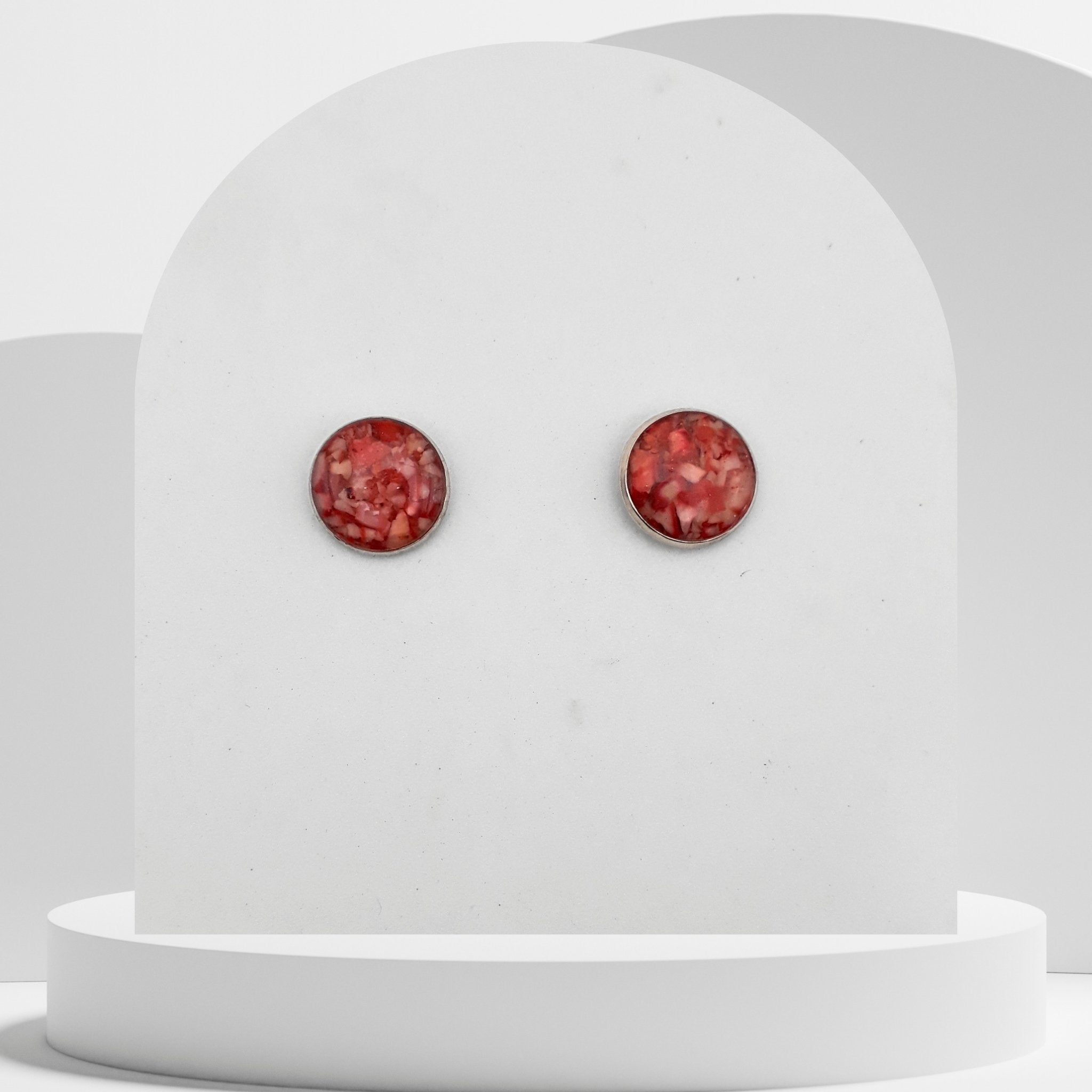 12mm stainless steel stud earrings with crushed natural red coral sealed in glossy resin bezel setting