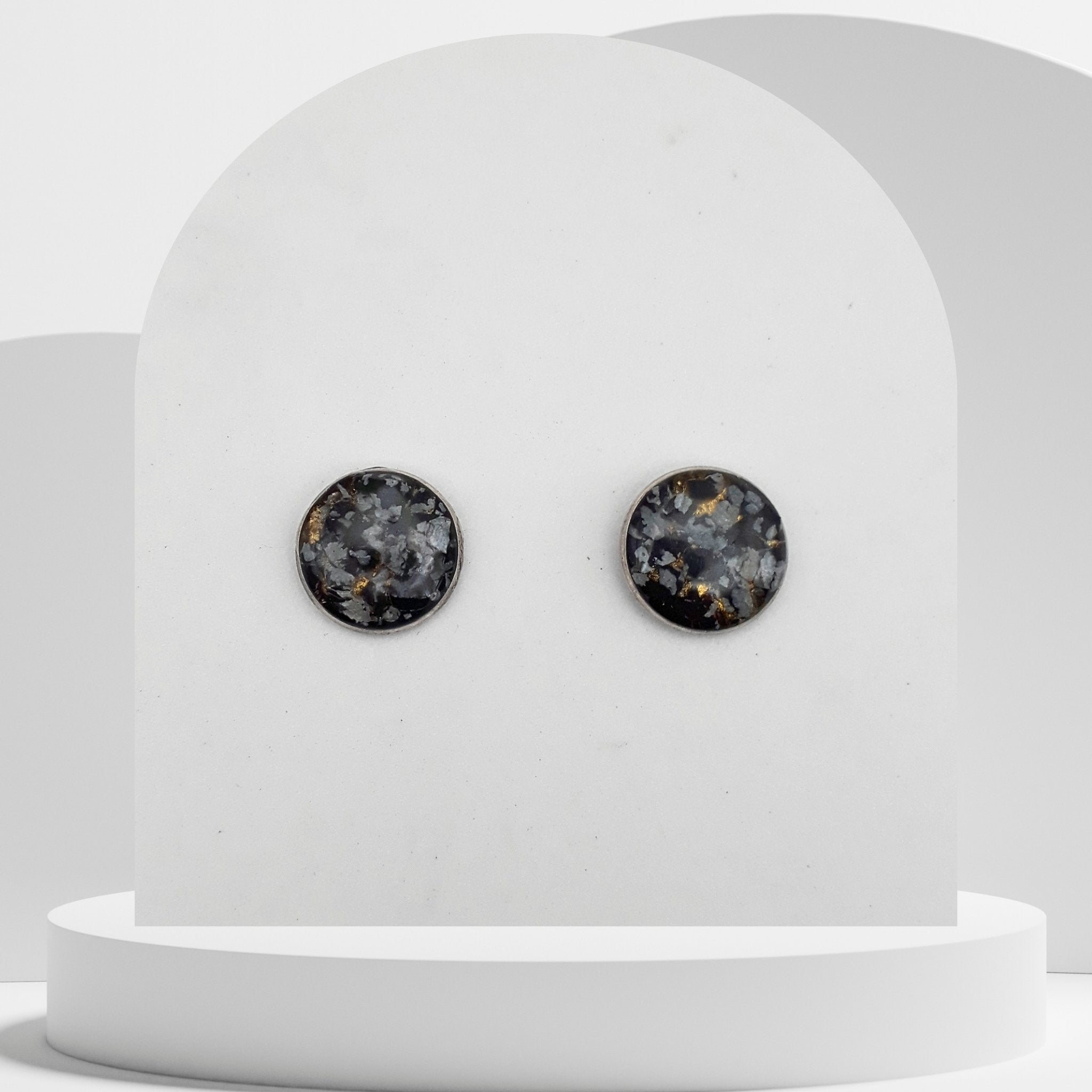 Stainless steel stud earrings with 14mm bezel set crushed snowflake obsidian and gold leaf sealed in glass-like resin