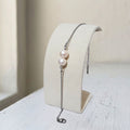 Double Pearl Bracelet featuring two genuine 7 mm freshwater pearls on a stainless-steel cable chain - Kiooinsitu