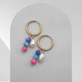 Gold-plated hoop earrings with a freshwater pearl and colorful beads charms