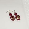 Handcrafted dark maroon polymer clay earrings with gold leaf and 316L stainless steel shepherd ear hooks
