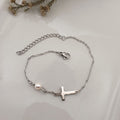 Handmade stainless steel bracelet with a AAAA grade freshwater pearl and little cross - Kiooinsitu