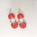 Handmade salmon pink arch and ribbed fan polymer clay dangle earrings with gold plated hardware - product flat lay