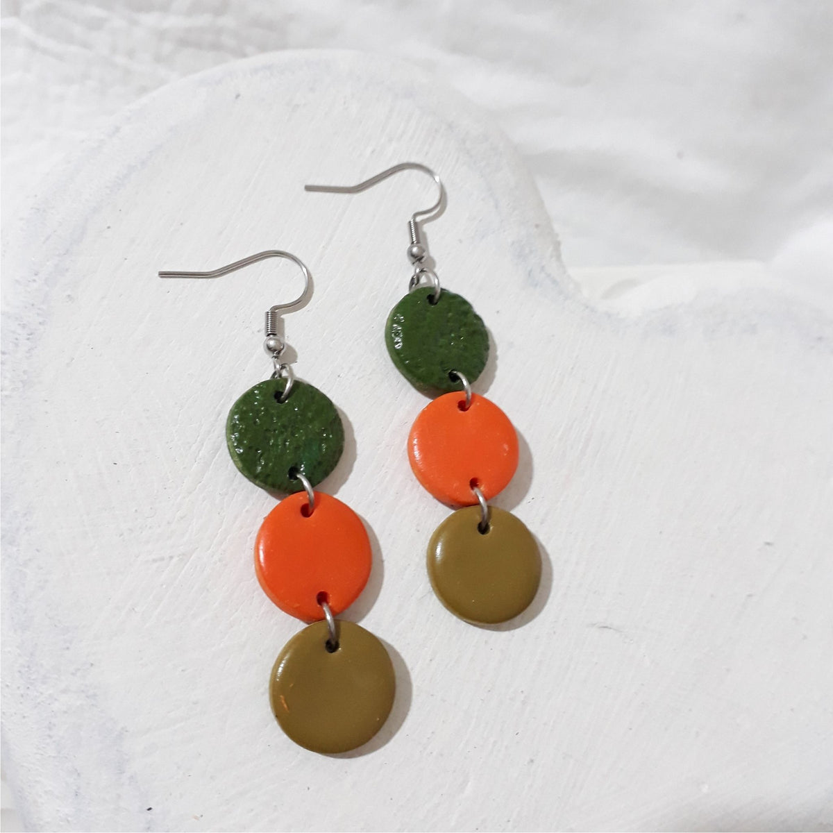 Moss green, orange and olive three-circle polymer clay cascade earrings with stainless steel shepherd hooks
