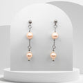 Peach pink freshwater pearl dangle earrings