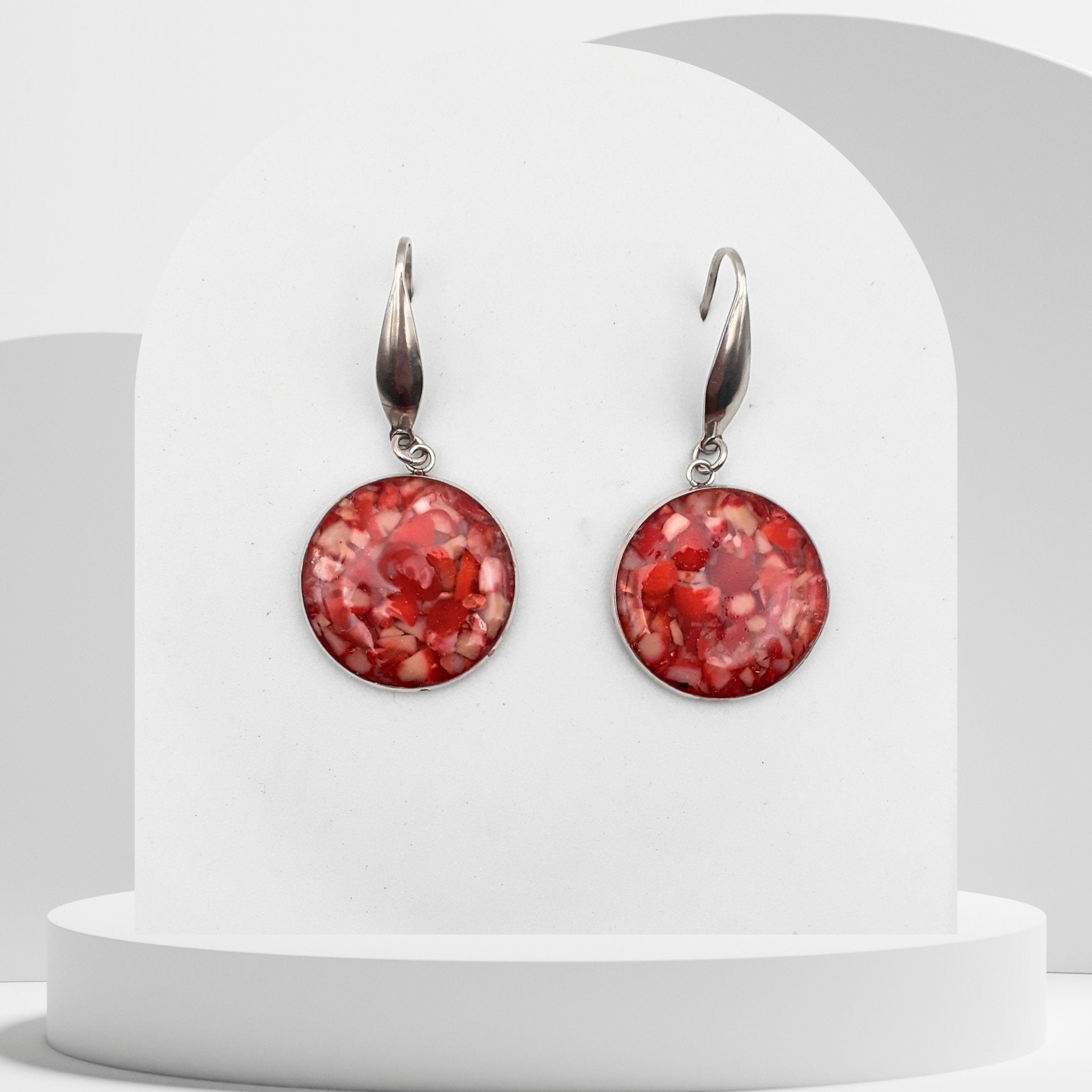 20mm stainless steel drop earrings with crushed natural red coral sealed in glossy resin and finished with elegant ear hooks