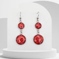 4cm stainless steel dangle earrings with 10mm and 16mm bezels filled with crushed natural red coral sealed in glossy resin