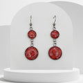 4cm stainless steel dangle earrings with 10mm and 16mm bezels filled with crushed natural red coral sealed in glossy resin