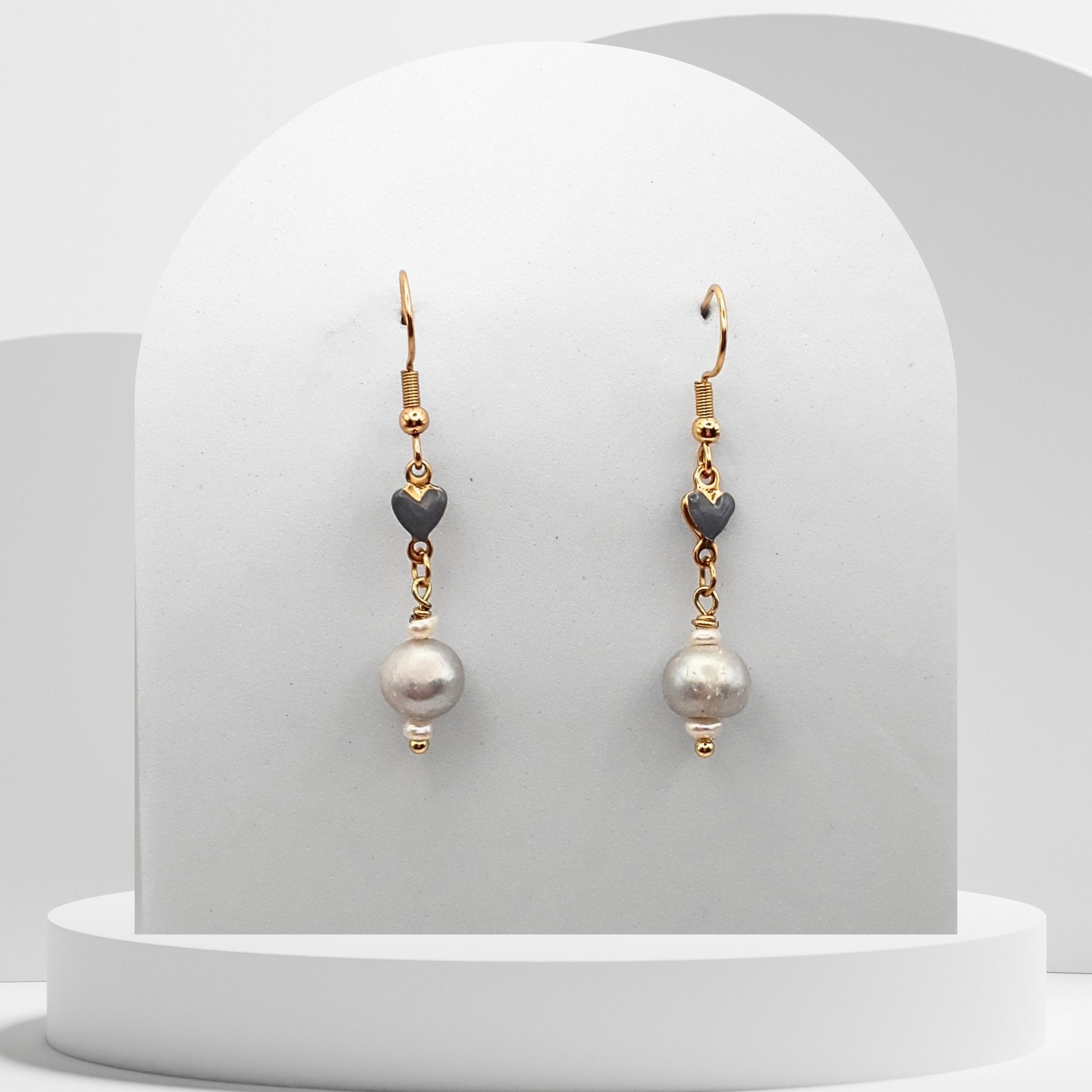 Freshwater Pearl gold‑plated stainless steel earrings with ceramic hearts.
