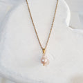 This handmade necklace pairs a 7mm pear-shaped freshwater pearl with a gold-plated stainless steel chain