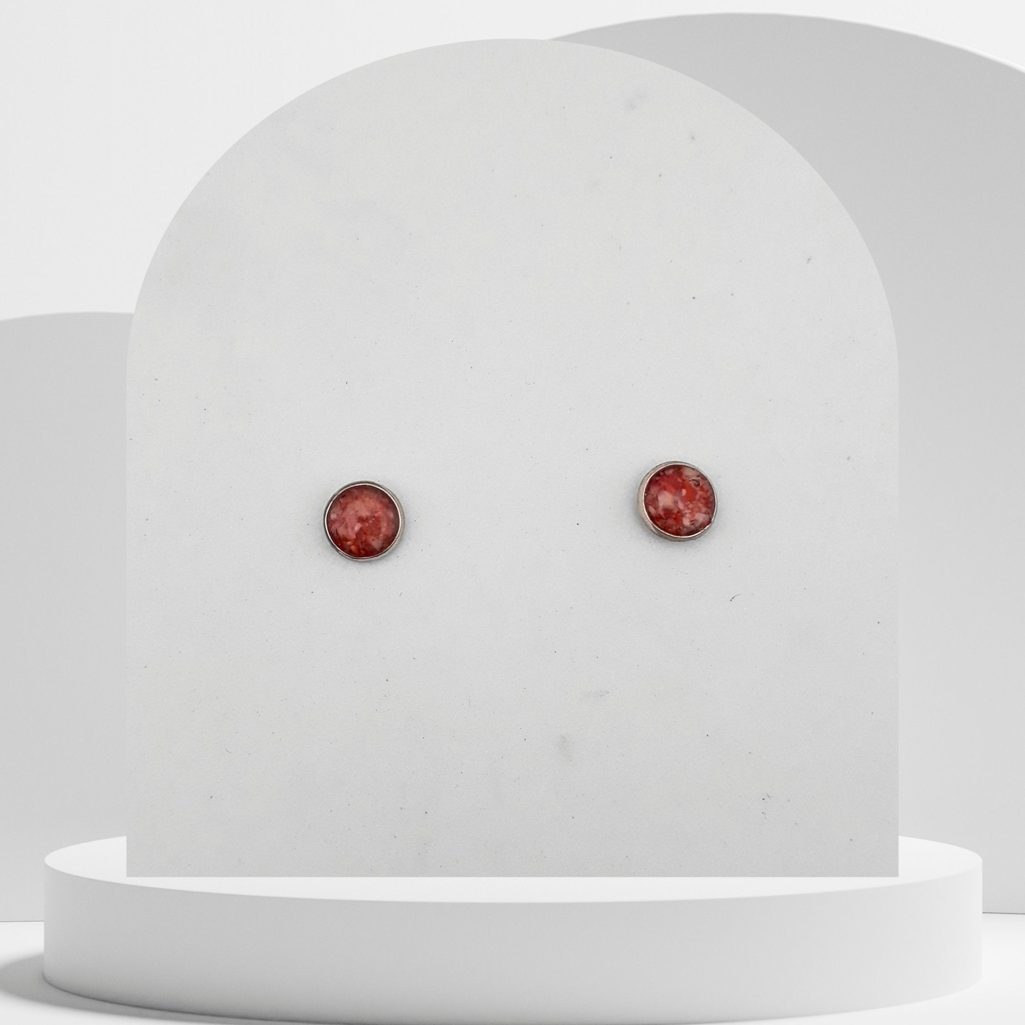 7mm stainless steel stud earrings with crushed natural red coral sealed in glossy resin bezel setting