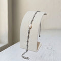 Single Pearl Bracelet featuring a single genuine 7 mm freshwater pearl on a stainless-steel star links chain - Kiooinsitu
