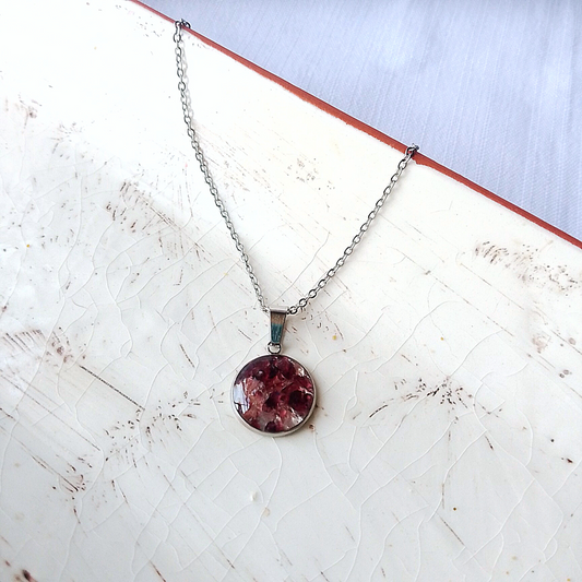 Our exclusive Garnet Birthstone Necklace—a true masterpiece crafted for those born in January.