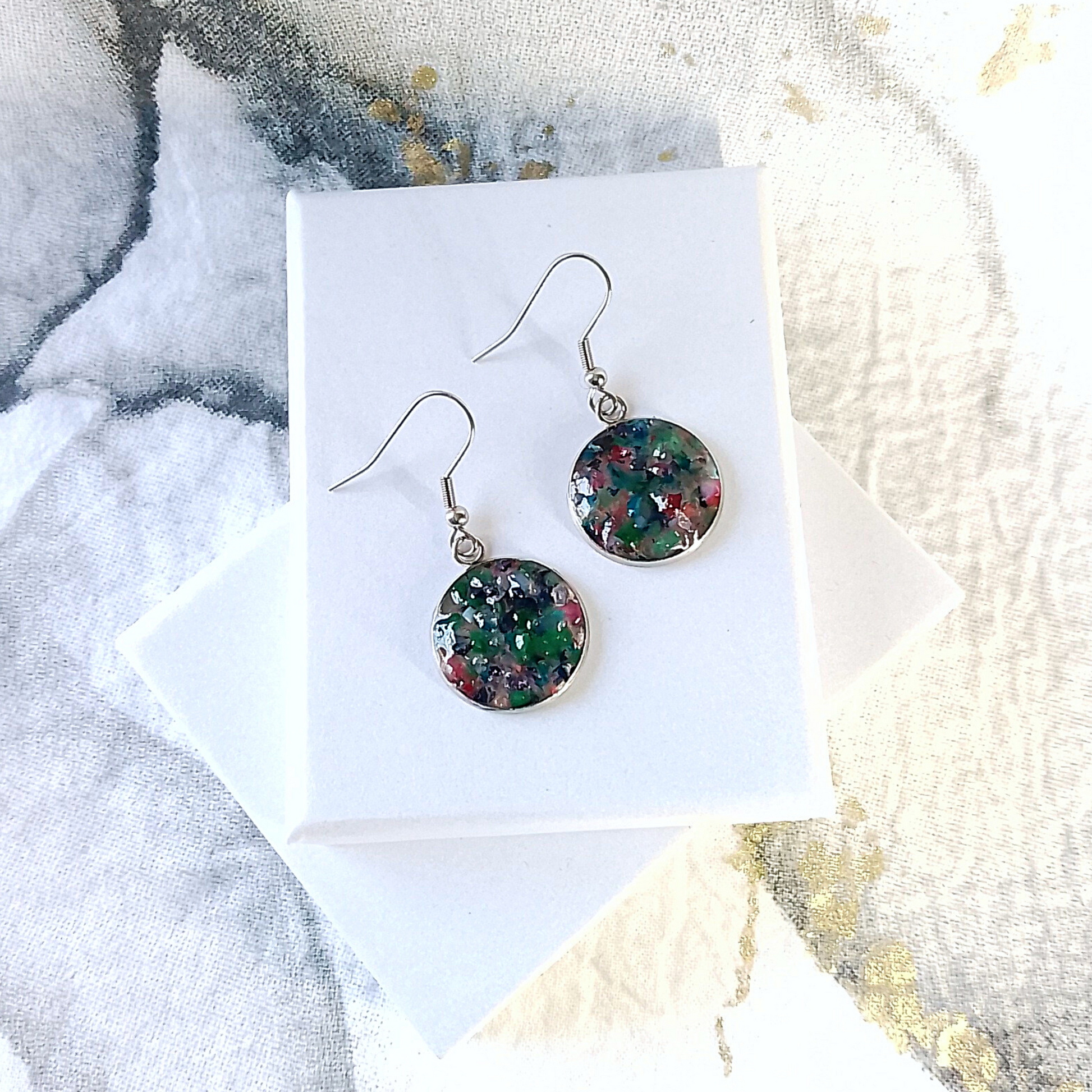 Elevate your jewelry collection with these Crushed Mixed Gemstone Earrings in Stainless Steel, a perfect blend of sophistication
