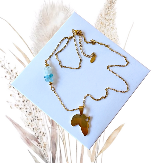 Stunning Gold Stainless Steel Necklace, a handmade masterpiece. This necklace features stunning Aquamarine gemstones and a Africa pendant, creating a captivating focal point.