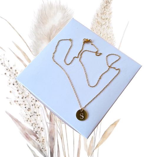 Whether worn alone for a chic minimalist look or layered with other necklaces for a trendy style, this Golden Stainless Steel Necklace a Letter S Pendant is a versatile piece that complements any wardrobe.