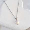 White freshwater coin pearl stainless steel necklace