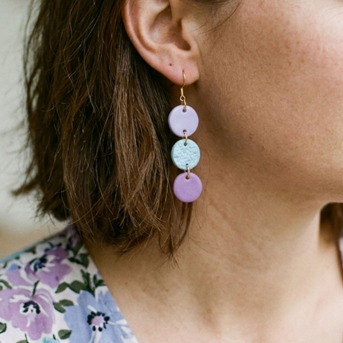 Woman wearing Lilac, Aqua and Lavender Gold-Plated Cascade Clay Earrings