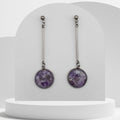 Stainless steel bar drop earrings with crushed amethyst gemstone resin discs and ball stud tops