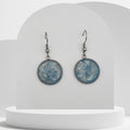 Stainless steel drop earrings with crushed aquamarine gemstones in 16mm resin bezel