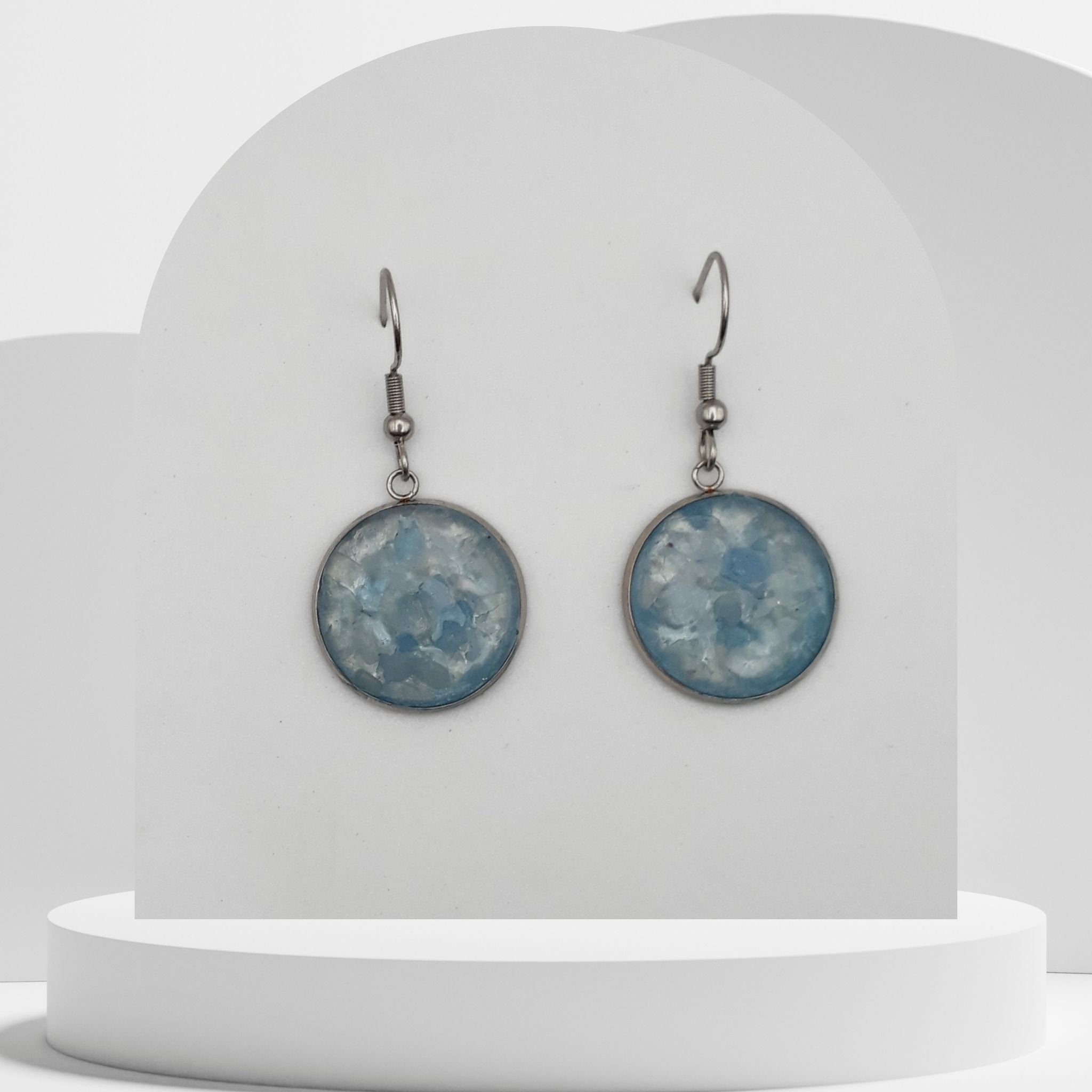 Stainless steel drop earrings with crushed aquamarine gemstones in 16mm resin bezel