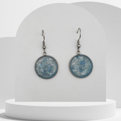 Stainless steel drop earrings with crushed aquamarine gemstones in 16mm resin bezel