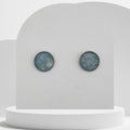 Stainless steel stud earrings with crushed aquamarine gemstones in 12mm resin bezel