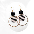 Black and white striped polymer clay statement earrings with gold-plated hoop and stainless steel hooks, handmade lightweight dangle earrings