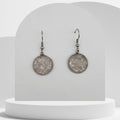 Stainless steel drop earrings with crushed clear quartz gemstones in 16mm resin bezel