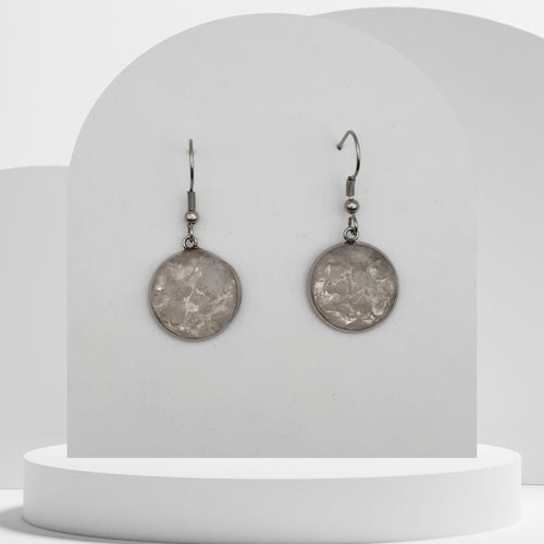 Stainless steel drop earrings with crushed clear quartz gemstones in 16mm resin bezel