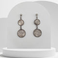 Stainless steel dangle earrings with 10mm and 14mm bezel set crushed clear quartz gemstones in resin, 4cm drop design with ball stud earrings