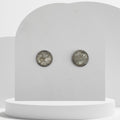 Stainless steel stud earrings with 12mm bezel set crushed clear quartz gemstones sealed in glass-like resin