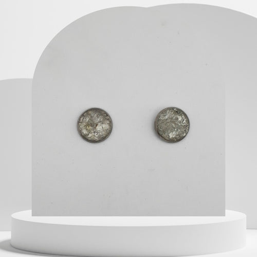 Stainless steel stud earrings with 12mm bezel set crushed clear quartz gemstones sealed in glass-like resin