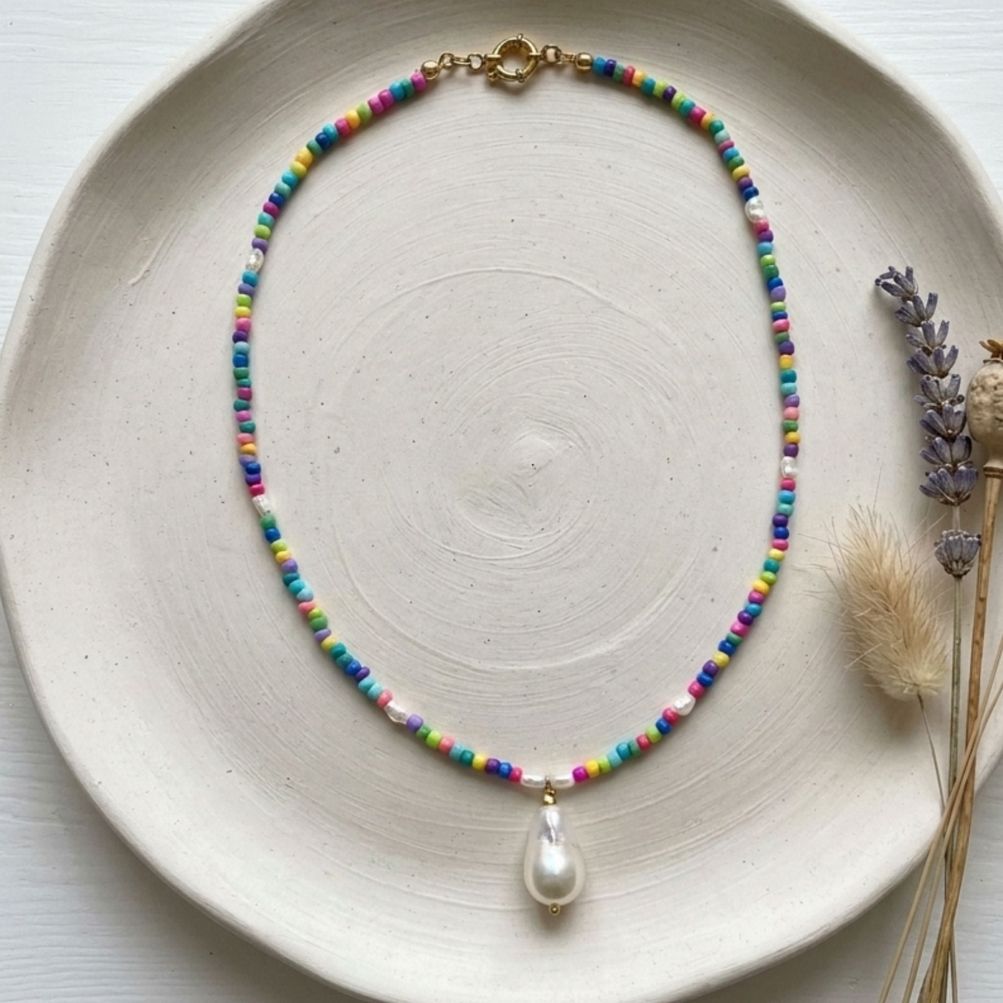 Handmade colourful bead necklace with natural white baroque pearl and rice pearls
