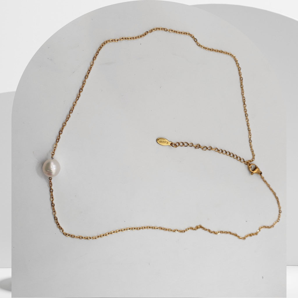 Gold plated stainless steel necklace with floating white freshwater pearls on cable chain