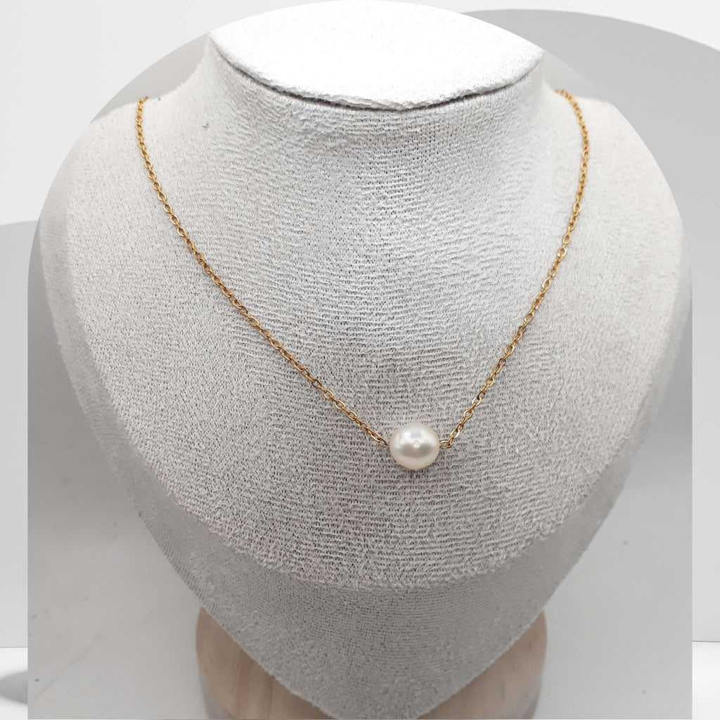 Gold plated stainless steel necklace with floating white freshwater pearls on cable chain