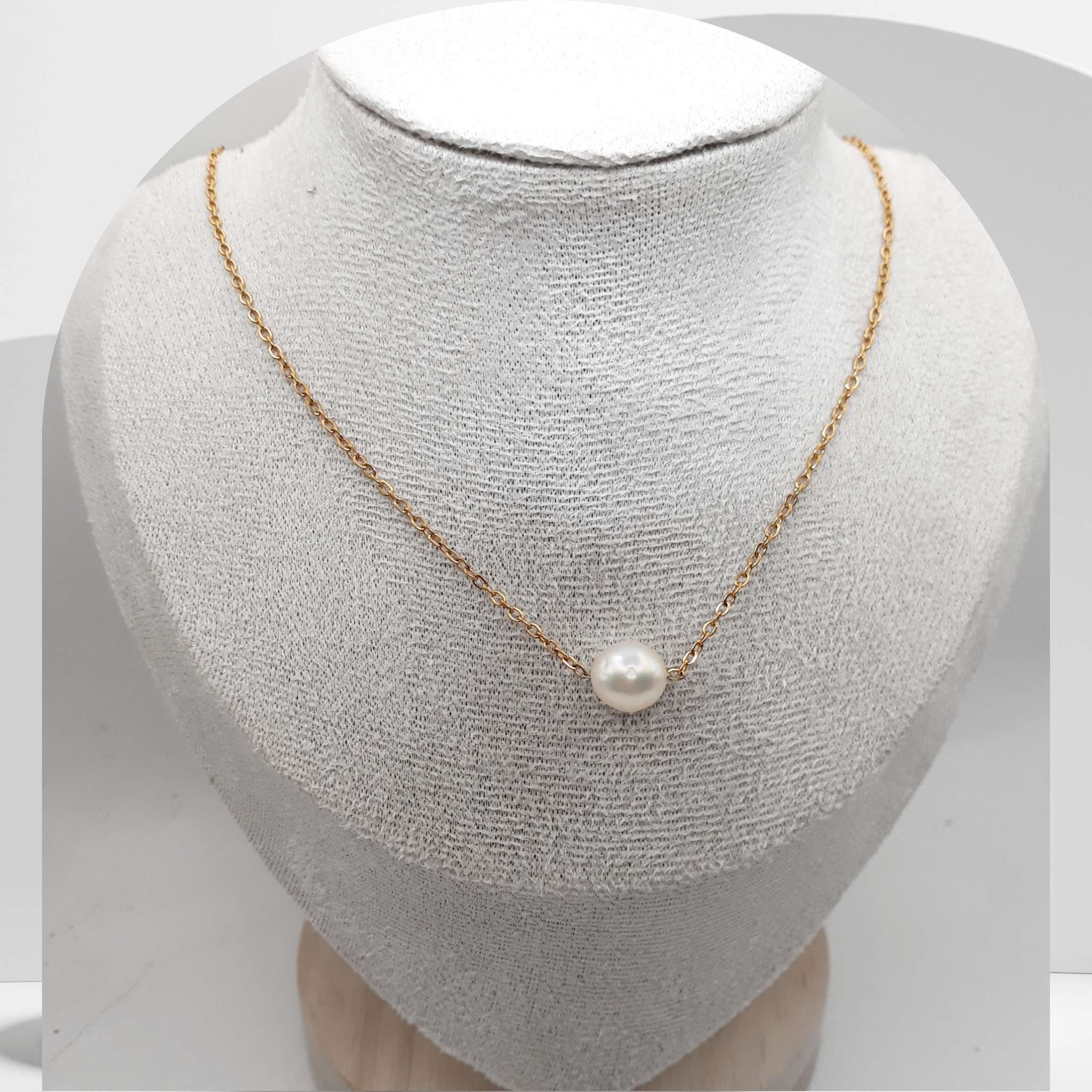Gold plated stainless steel necklace with floating white freshwater pearls on cable chain