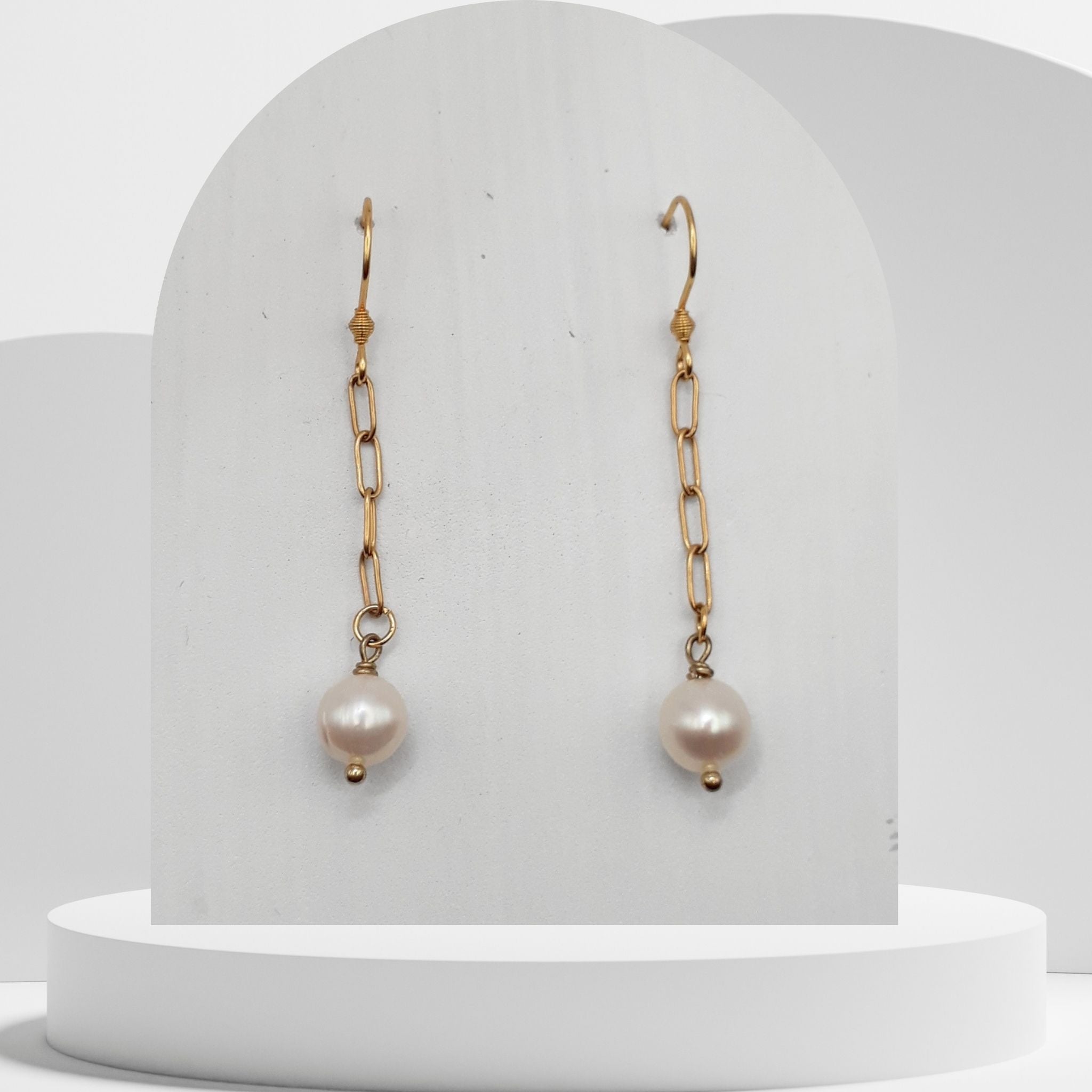 Handmade white freshwater pearl dangle earrings with gold paperclip chain and hooks