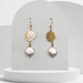 Gold monstera leaf drop earrings with white freshwater coin pearl and stainless steel gold plated hooks