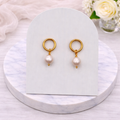 Gold open circle stud freshwater pearl earrings