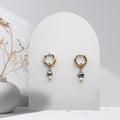Handmade 316L gold-plated stainless steel 12 mm huggie hoop earrings with removable natural silver and white freshwater rice pearl charms.
