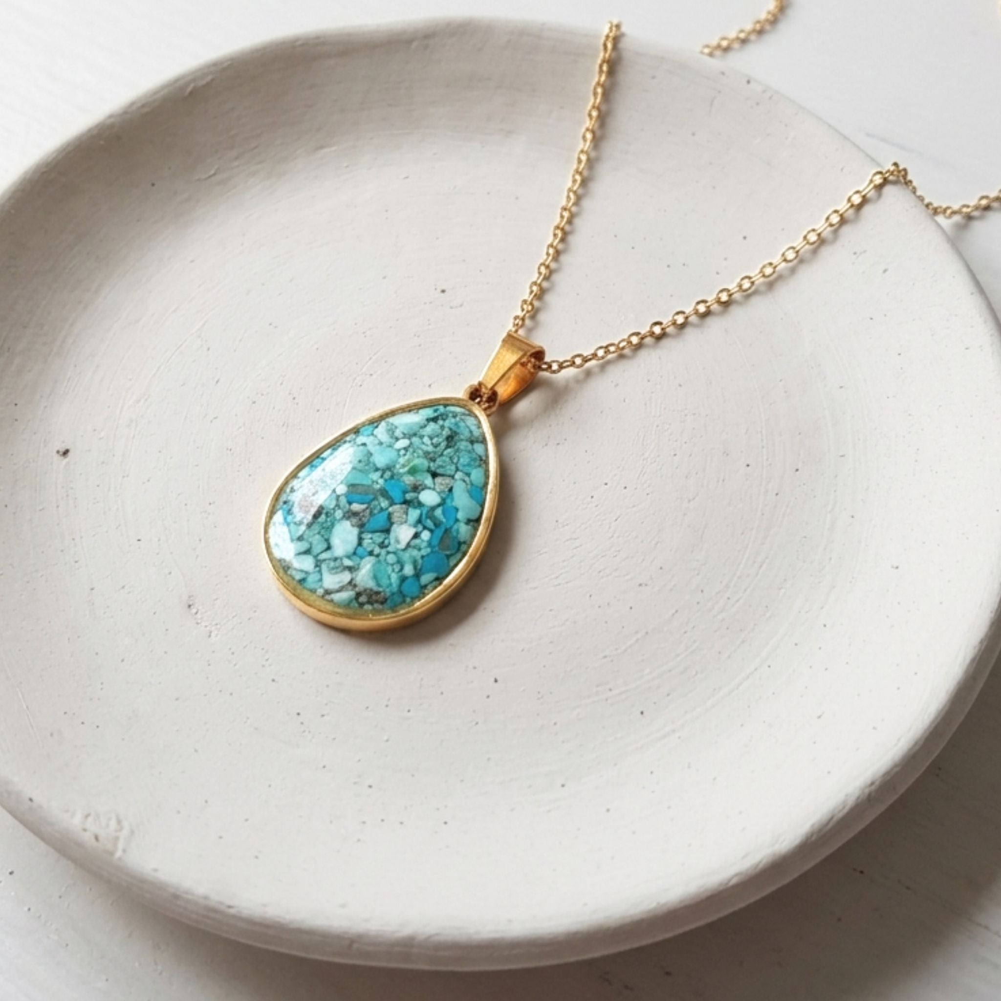 Handmade gold plated stainless steel necklace with crushed turquoise teardrop pendant
