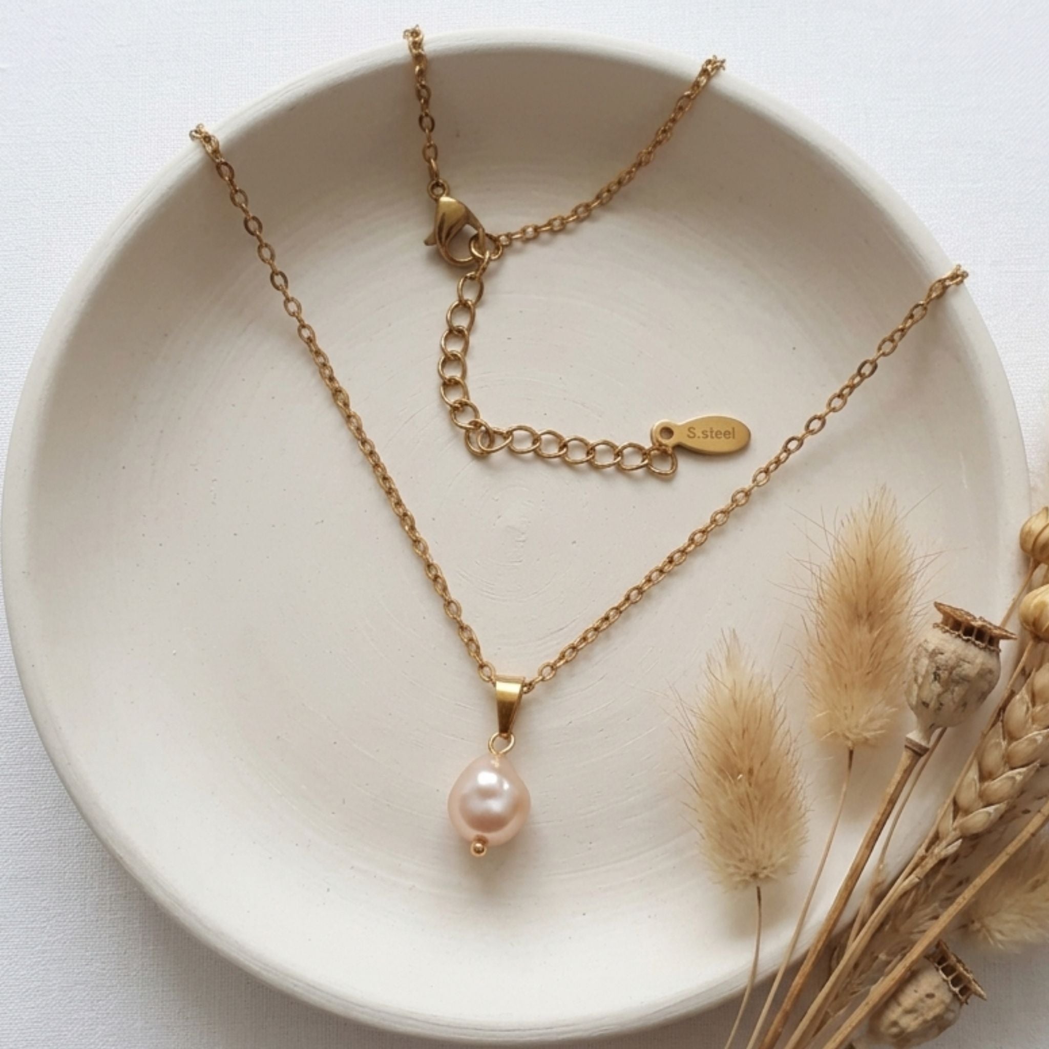 Handmade gold-plated stainless steel necklace with soft pink 7mm pear-shaped freshwater pearl