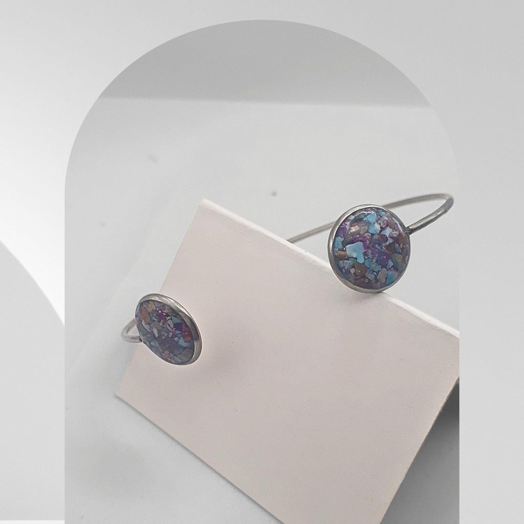 Handmade stainless steel open cuff bangle with crushed Imperial Jasper sealed in resin
