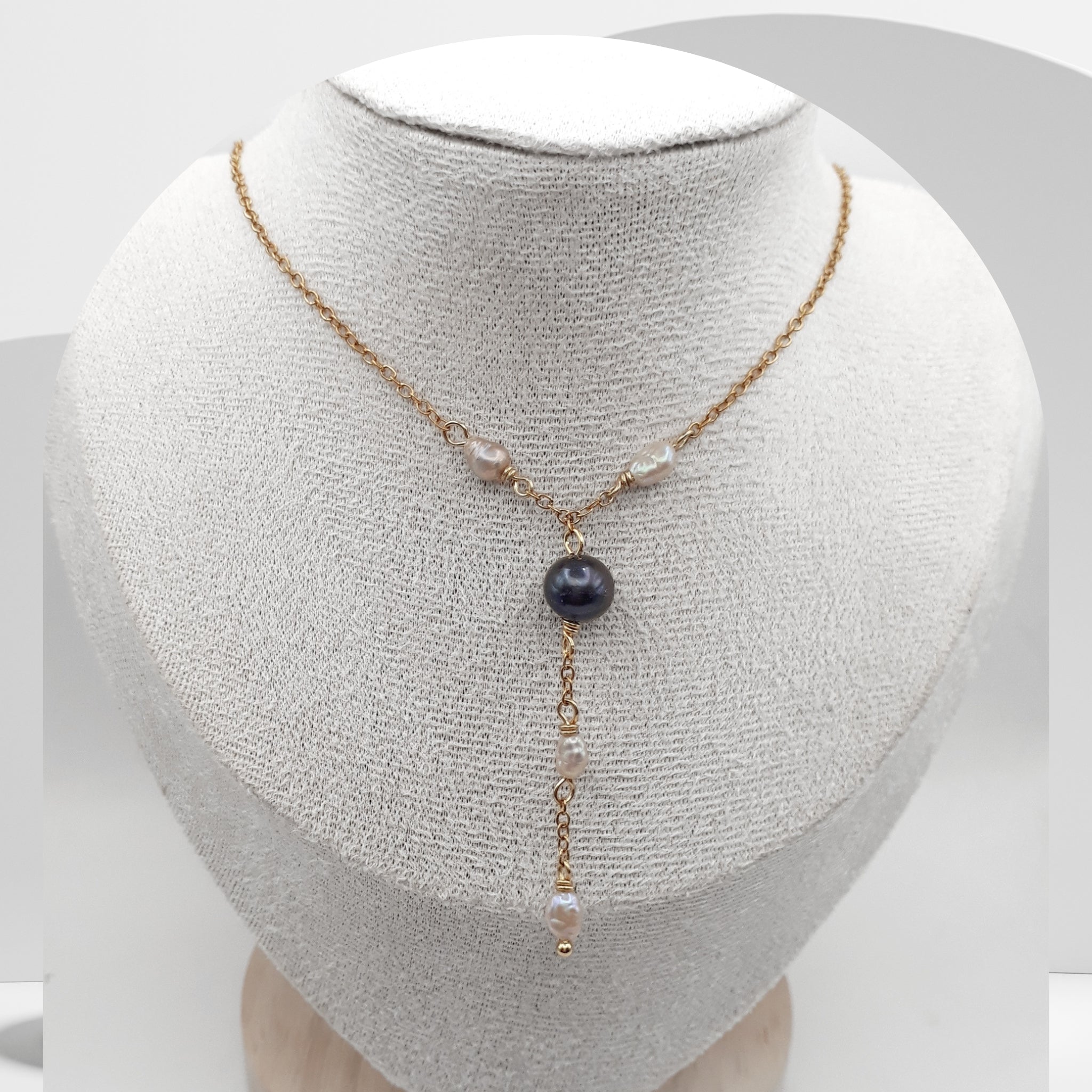 Handmade gold plated stainless steel Y necklace with midnight blue freshwater pearl and white rice pearls
