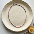 Handmade multicolour glass bead necklace with seven natural white rice pearls